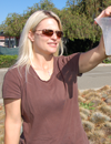 Clean Water Programs Specialist Stefanie Olson performs cup testing to measure the efficiency of an irrigation system.