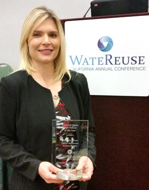 Stefanie Olson receives the WateReuse Staff Of The Year award.