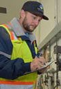 Water/Wastewater Systems Operator IV-On Call Dan Pettinichio checks Water Quality Analyzers.