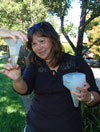 Environmental Compliance Inspector II-Clean Water Florence Khaw inspects recycled water in a container.