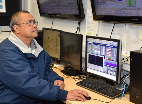 Process Lead Wastewater Treatment Plant Operator V Virgil Sevilla controls the SCADA computer system.