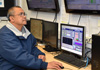 Process Lead Wastewater Treatment Plant Operator V Virgil Sevilla controls the SCADA computer system.