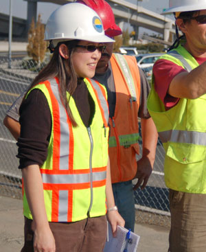 Associate Engineer-Supervisor Jackie Yee takes a look at a project site.