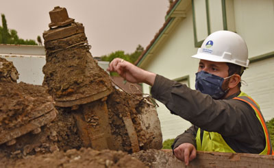 DSRSD Associate Civil Engineer Sean O’Reilly examines corrosion on removed valves.