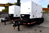 Two new portable generators are set up on trailers in case they are needed.